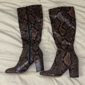 Snakeskin heeled boots